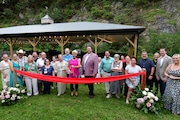 The Red Mill Museum Village dedicated their new pavilion in the quarry on Monday evening, September 5, 2023.
Here, Town of Clinton Mayor Janice Kovach cuts the ribbon officially opening the new pavilion at the mill.