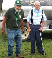 CAPTION
Irv Hockenbury (left) and Bart Case are in front of a 1952 bulk milk tank truck. Both are alumni of the Mount Airy Dairy 4-H Club.