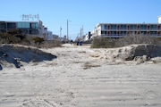 A dune breach near 13th Avenue in North Wildwood, NJ, opened up in January 2024. Water was soon seen pouring into the wetlands near 14-15th Avenues in March. Meanwhile, the city is awaiting a massive replenishment project that's not set to benefit beach there until 2025.