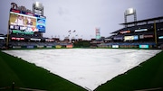 A tarp covers the infield as rain delays a baseball game between the Philadelphia Phillies and the Atlanta Braves, Wednesday, June 21, 2023, in Philadelphia. (AP Photo/Matt Slocum) AP